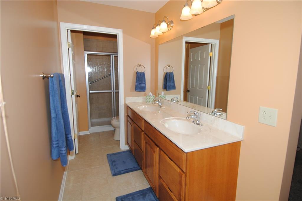 2273 Volunteer Road Pinnacle, NC 27043 - Photo 22 of 30 3rd bath in bedroom & walk in shower