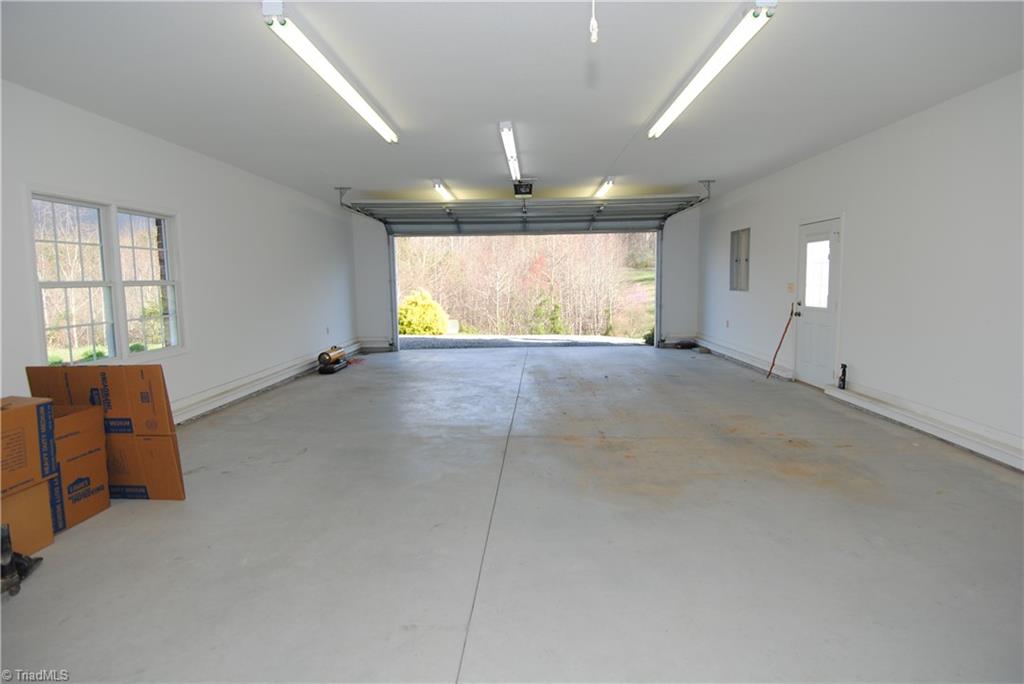 2273 Volunteer Road Pinnacle, NC 27043 - Photo 23 of 30 Oversized 2 car attached garage.