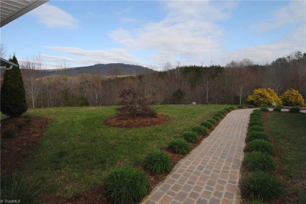 2273 Volunteer Road Pinnacle, NC 27043 - Photo 4 of 30 Views of Sauratown Mt. from the covered front porch.