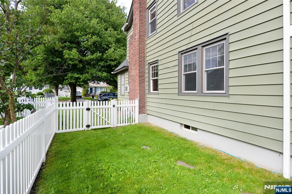 570 Shelton Road Ridgewood, NJ 07450 - Photo 23 of 26 a view of a house with a backyard