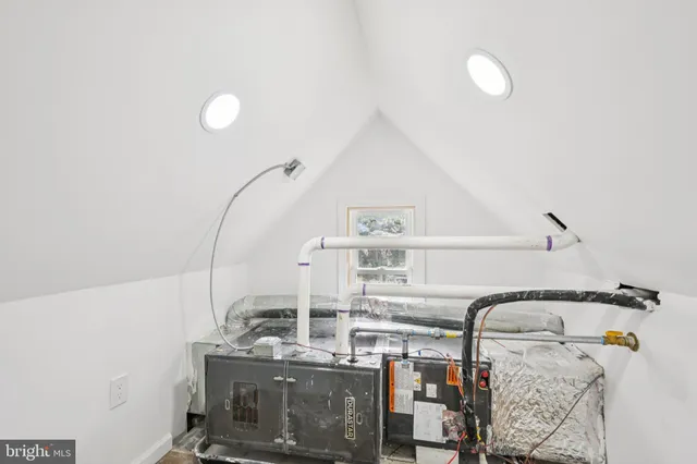 a view of staircase with white walls