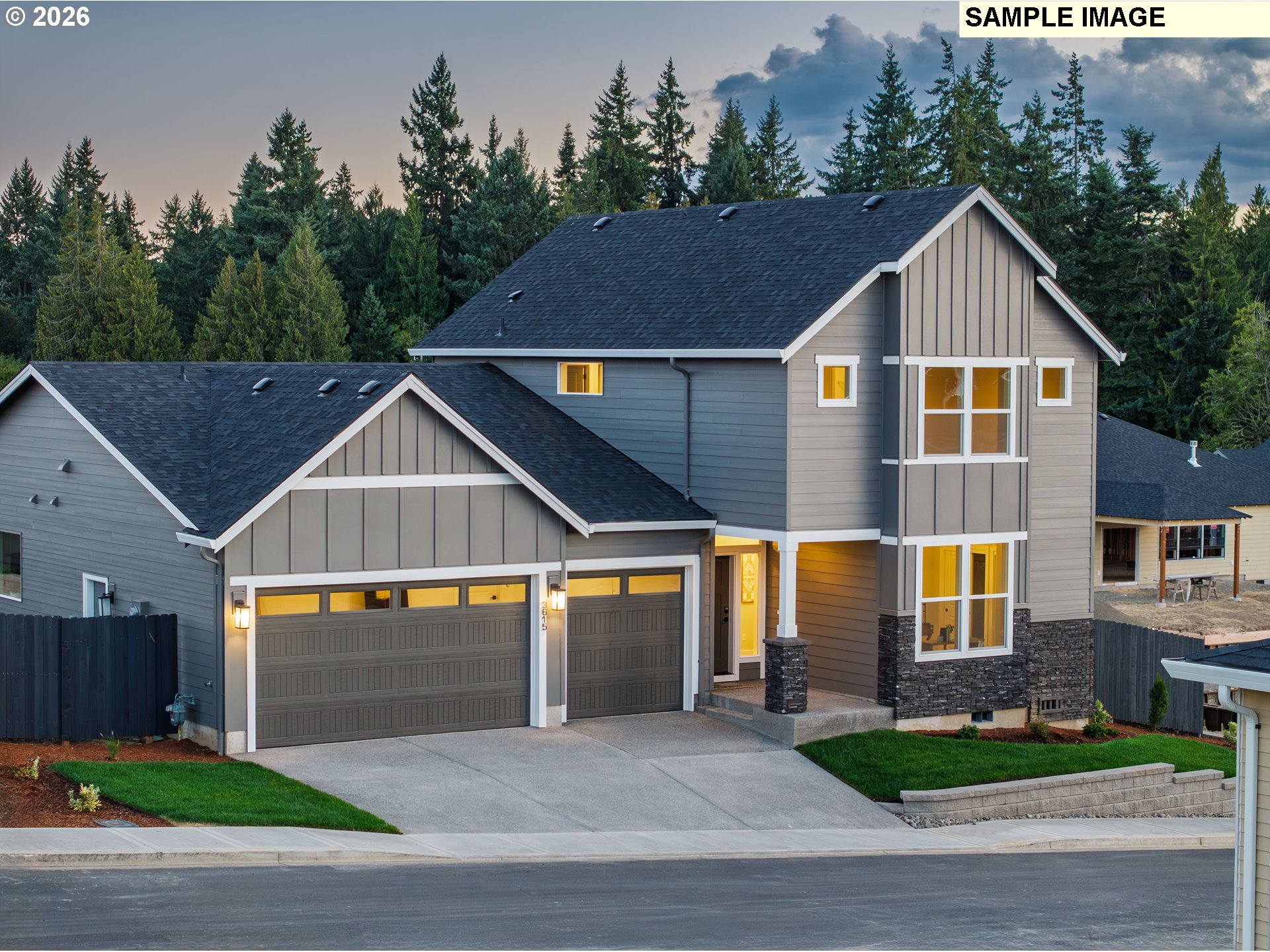a front view of house with yard and green space