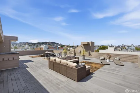 a view of a terrace with seating space