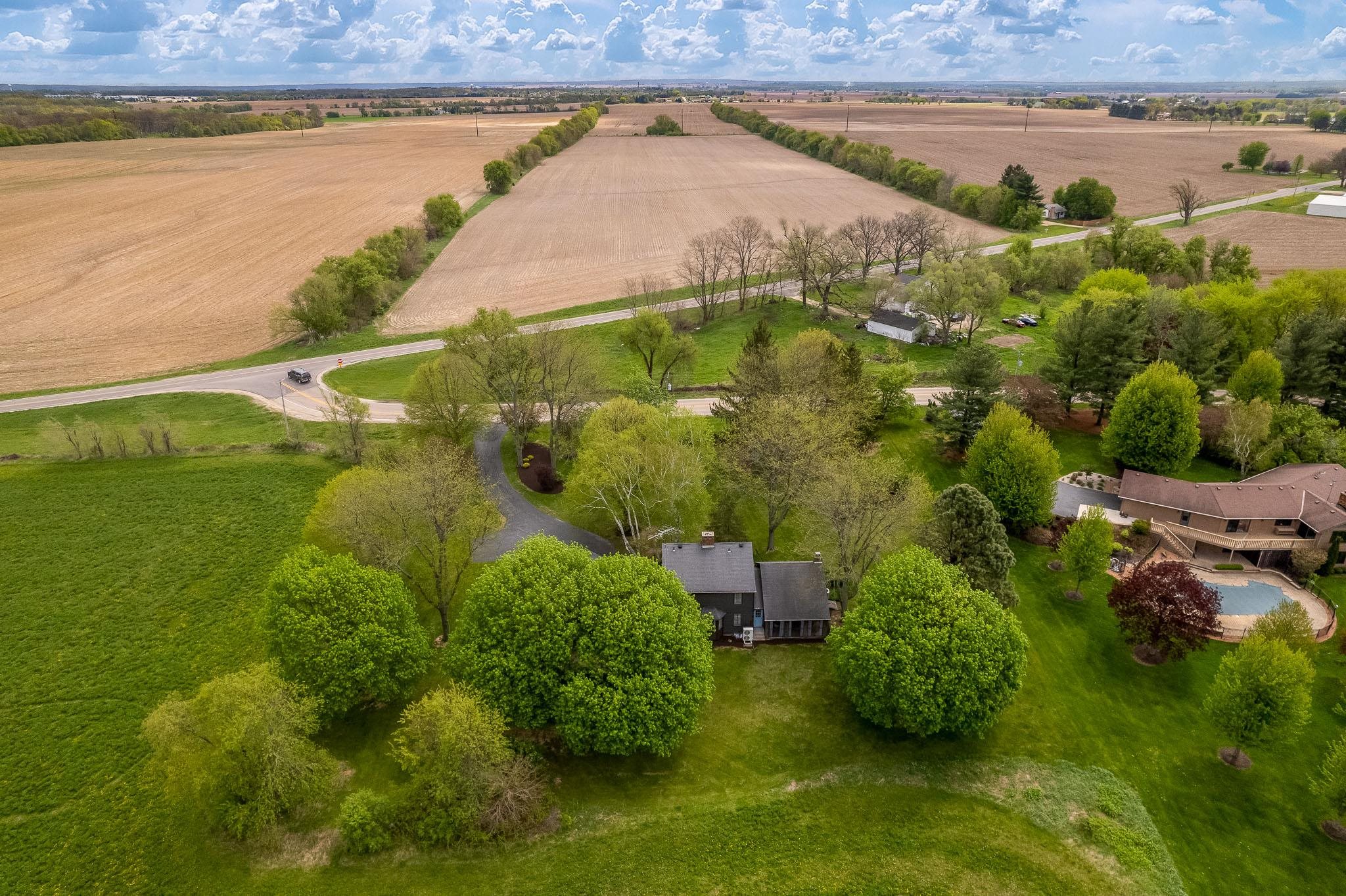 10562 Town Hall Road Belvidere, IL 61008 - Photo 68 of 72 a view of a water pond with green field