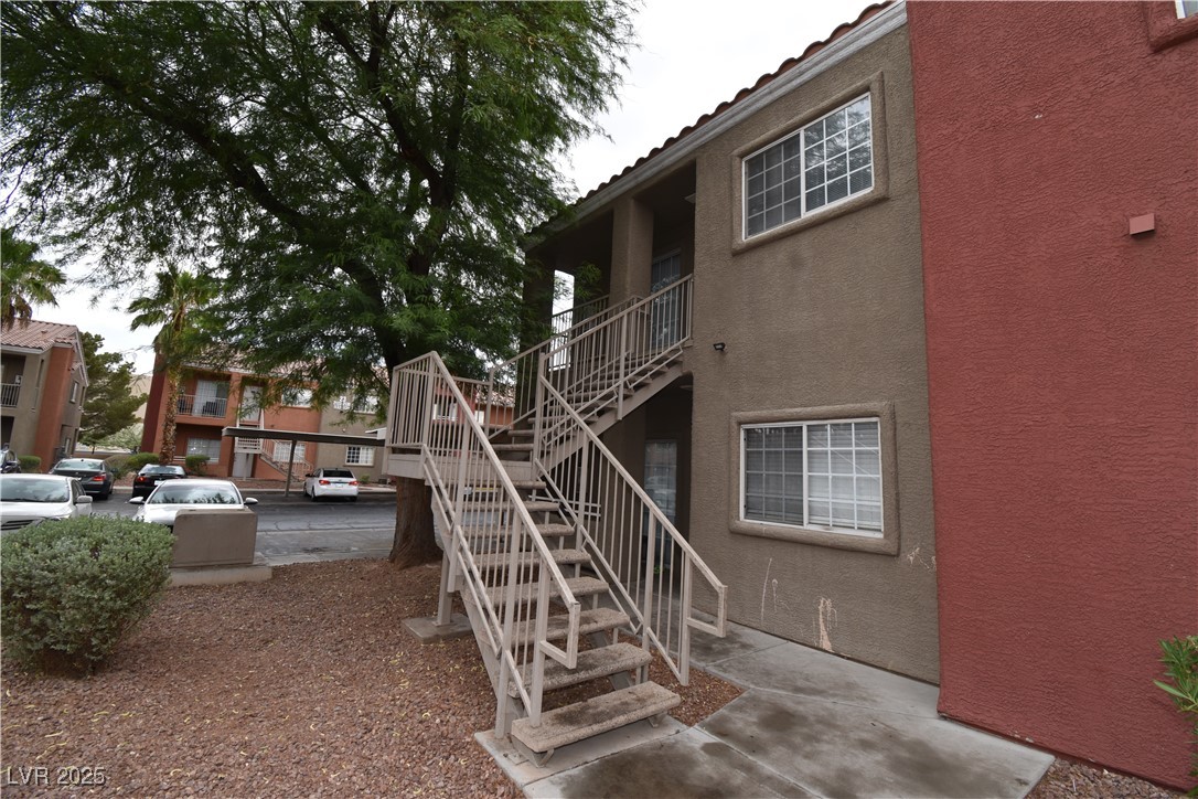 4730 East Craig Road, Unit 2094 Las Vegas, NV 89115 - Photo 11 of 12 View of building exterior with stairway