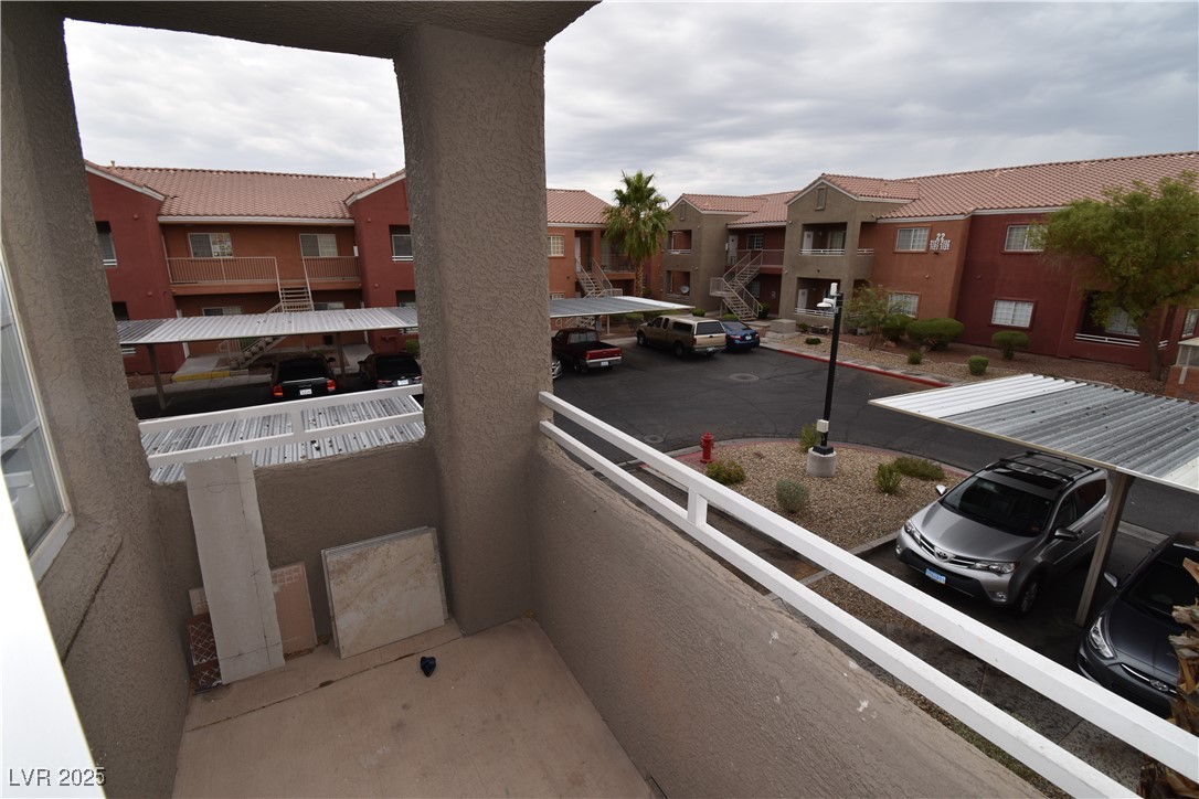 4730 East Craig Road, Unit 2094 Las Vegas, NV 89115 - Photo 9 of 12 Balcony featuring a residential view