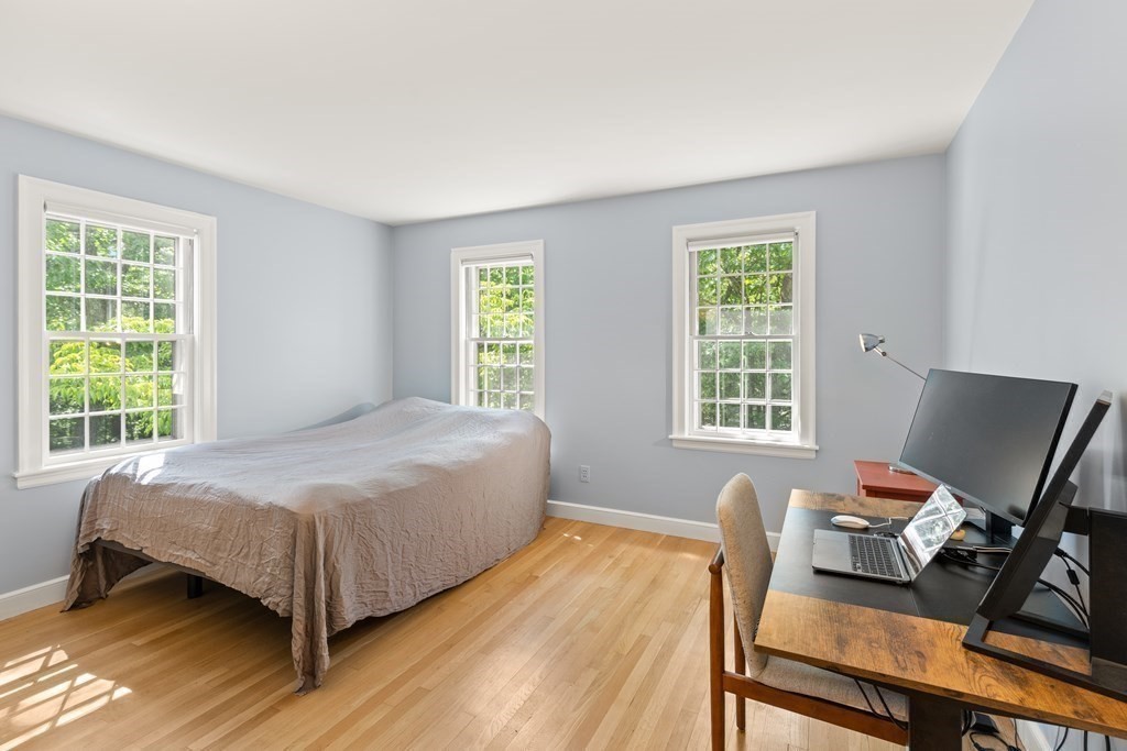 58 Old Coach Road Sudbury, MA 01776 - Photo 37 of 40 a bedroom with a bed and a window