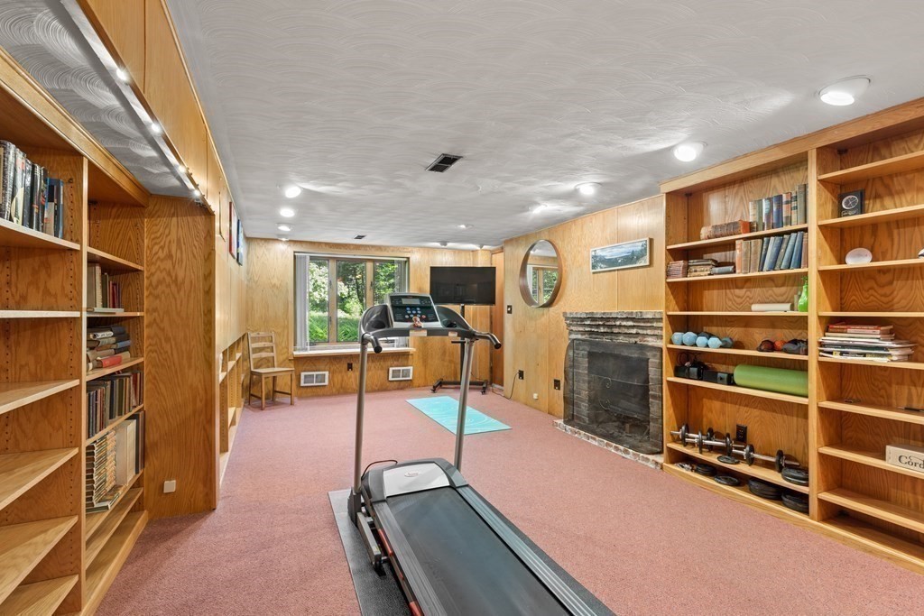 58 Old Coach Road Sudbury, MA 01776 - Photo 38 of 40 a view of a room with shelves