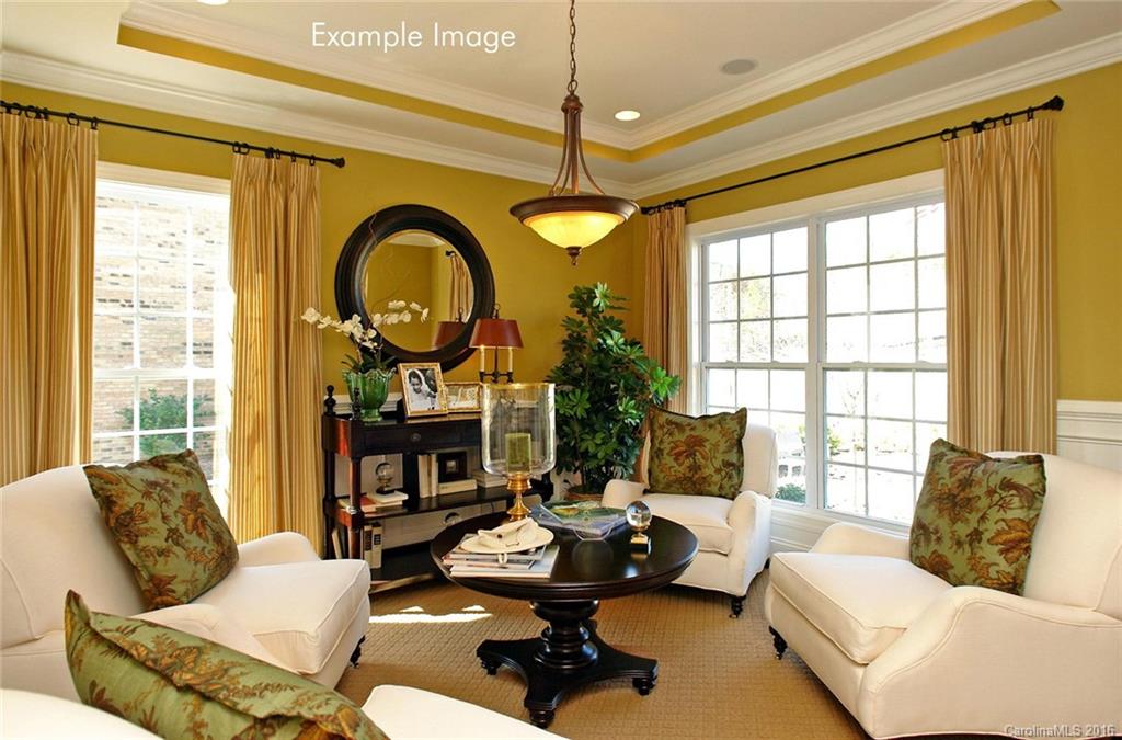 5271 Meadowcroft Way, Unit HAG0036 Fort Mill, SC 29708 - Photo 2 of 9 a living room with fireplace furniture and a large window