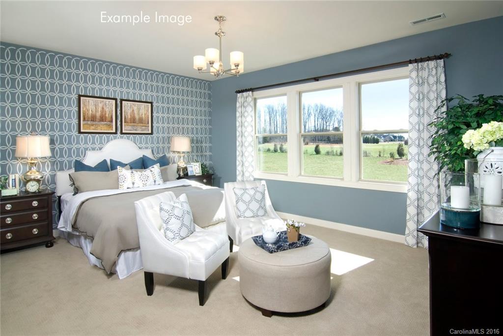 5271 Meadowcroft Way, Unit HAG0036 Fort Mill, SC 29708 - Photo 6 of 9 a bedroom with bed and a large window