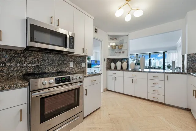 $7,750 | 1 Grove Isle Drive, Unit A908, Miami, FL 33133