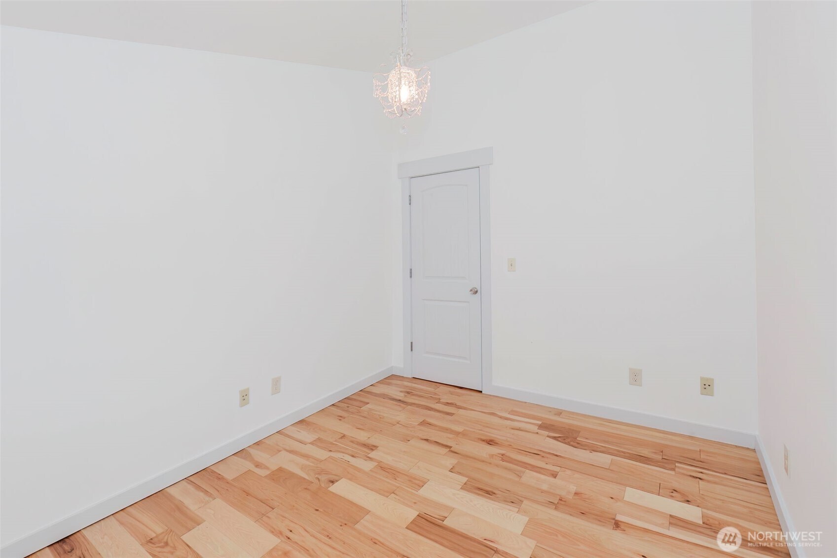 12241 Olalla Valley Road Southeast Olalla, WA 98359 - Photo 29 of 39 a view of empty room with wooden floor