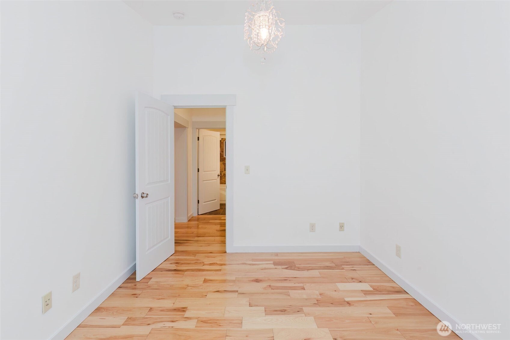 12241 Olalla Valley Road Southeast Olalla, WA 98359 - Photo 35 of 39 a view of an empty room with wooden floor