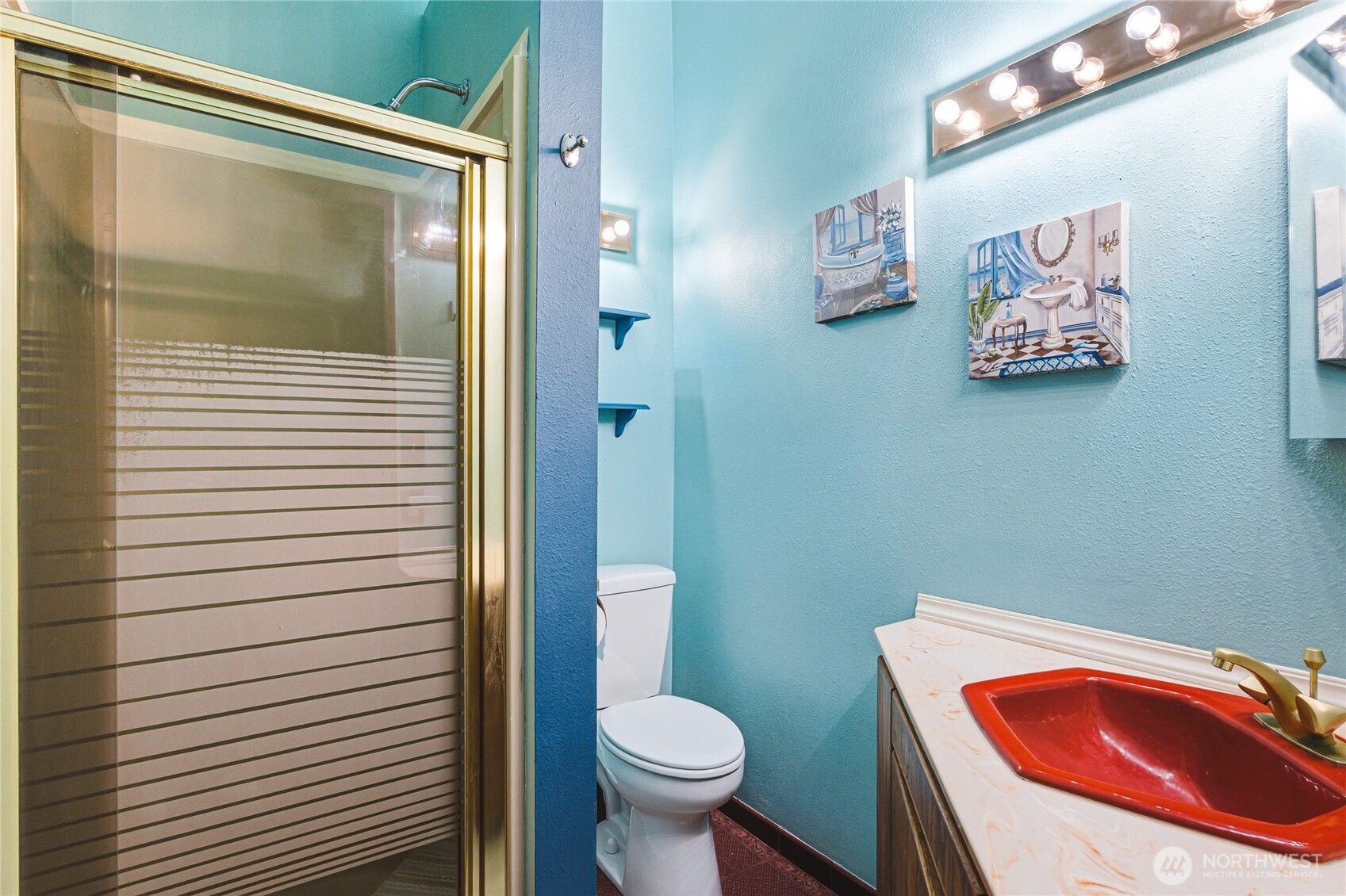 11090 25th Avenue Southwest Seattle, WA 98146 - Photo 18 of 38 a bathroom with a toilet and a sink