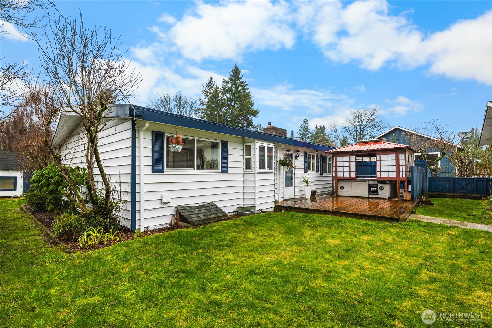 11090 25th Avenue Southwest Seattle, WA 98146 - Photo 28 of 38 a view of a house with a yard porch and sitting area