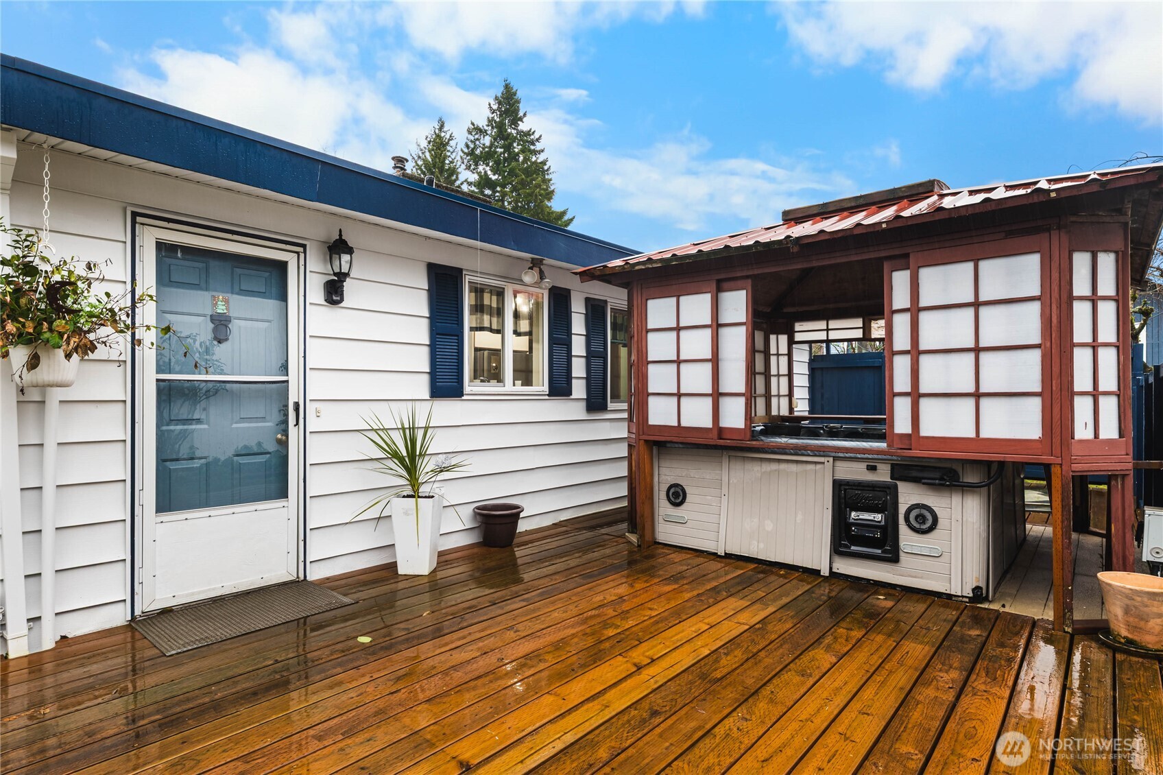11090 25th Avenue Southwest Seattle, WA 98146 - Photo 30 of 38 a view of a house with a patio