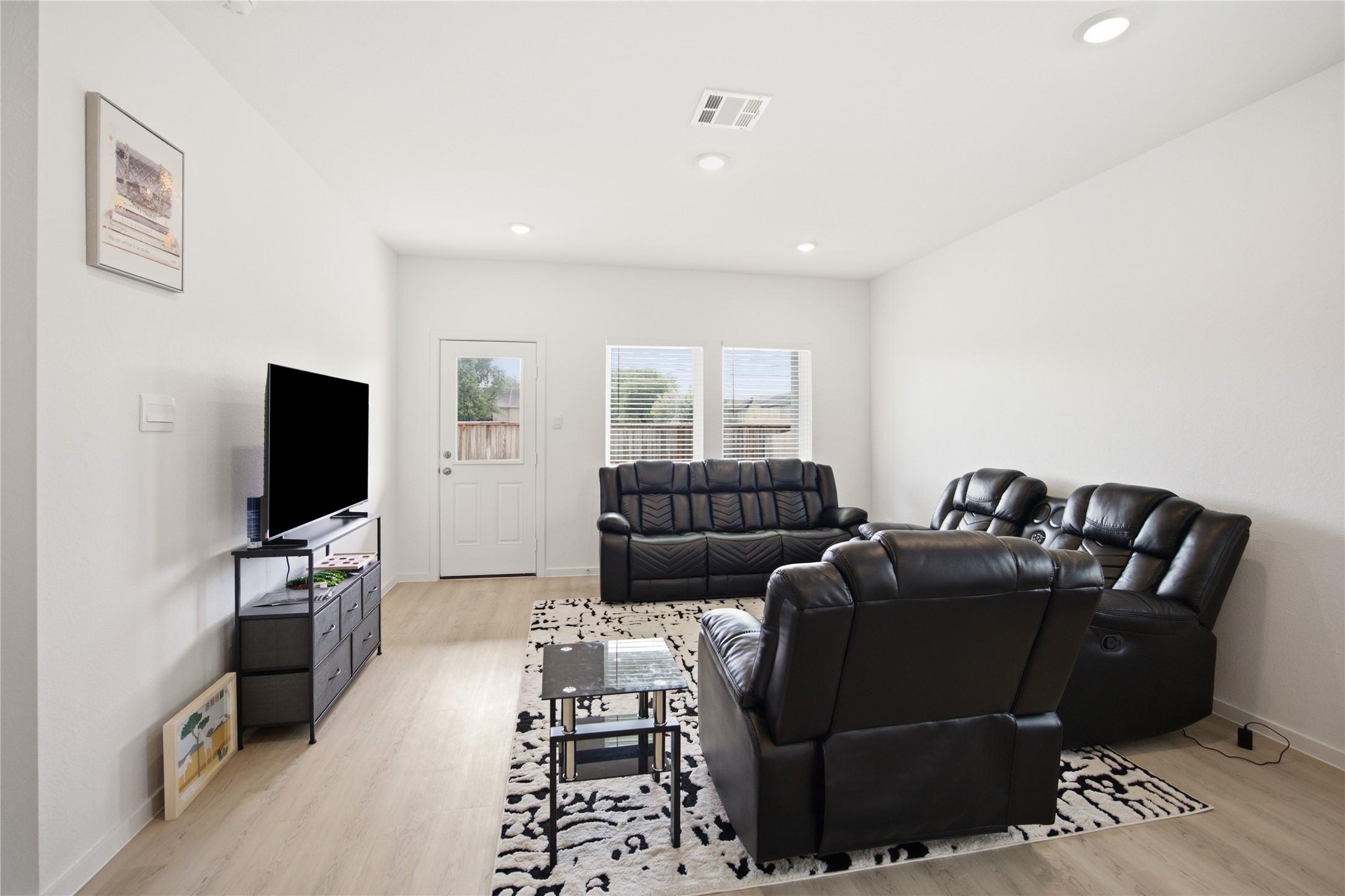 7 Robin Court Angleton, TX 77515 - Photo 6 of 27 Living room view — Bright living area with natural light.