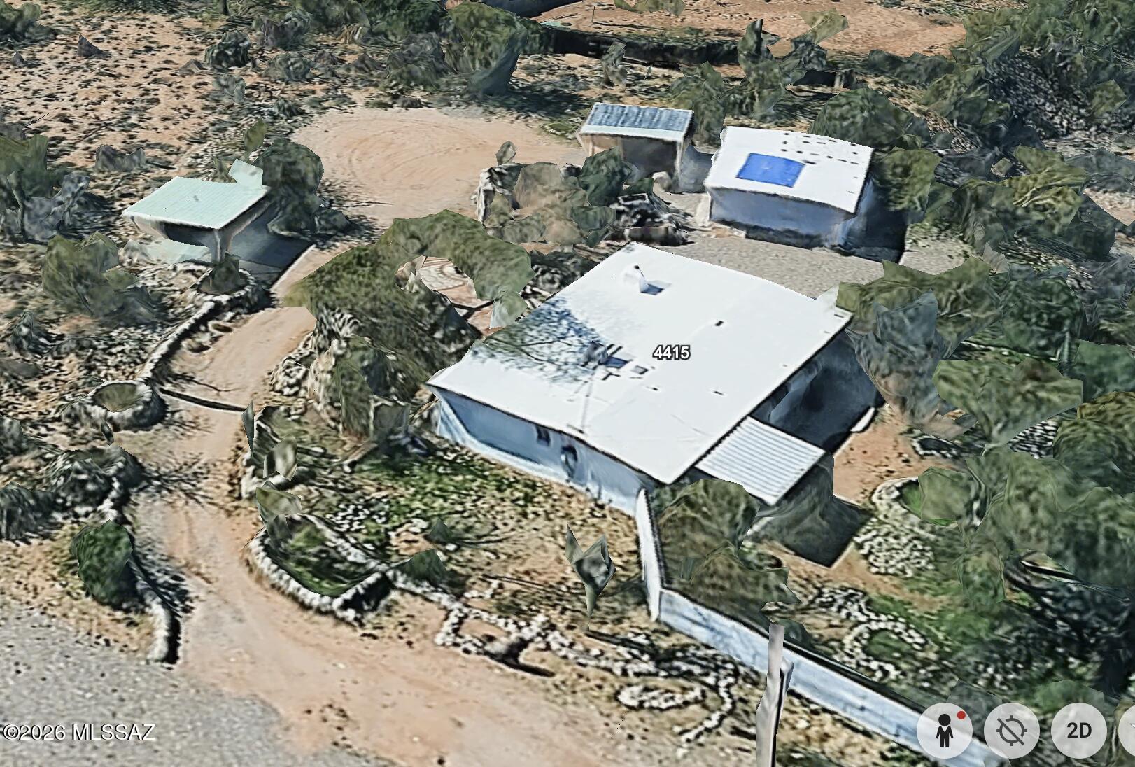4415 North Swan Road Tucson, AZ 85718 - Photo 4 of 33 an aerial view of a house with a yard