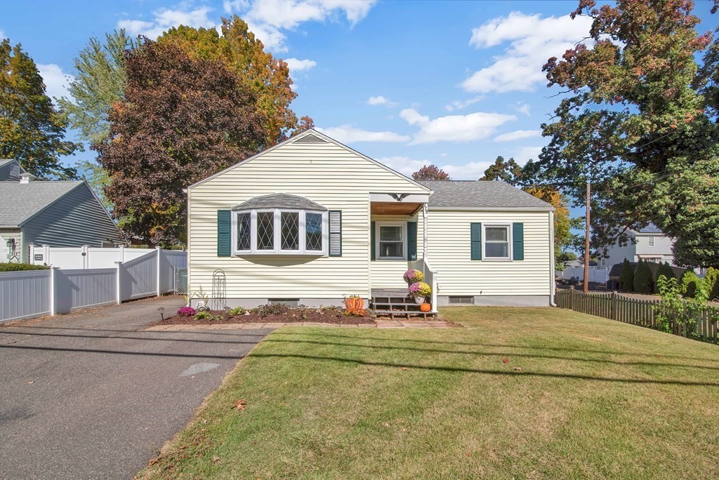975 Allen Street Springfield, MA 01118 - Photo 28 of 30 a front view of a house with a yard