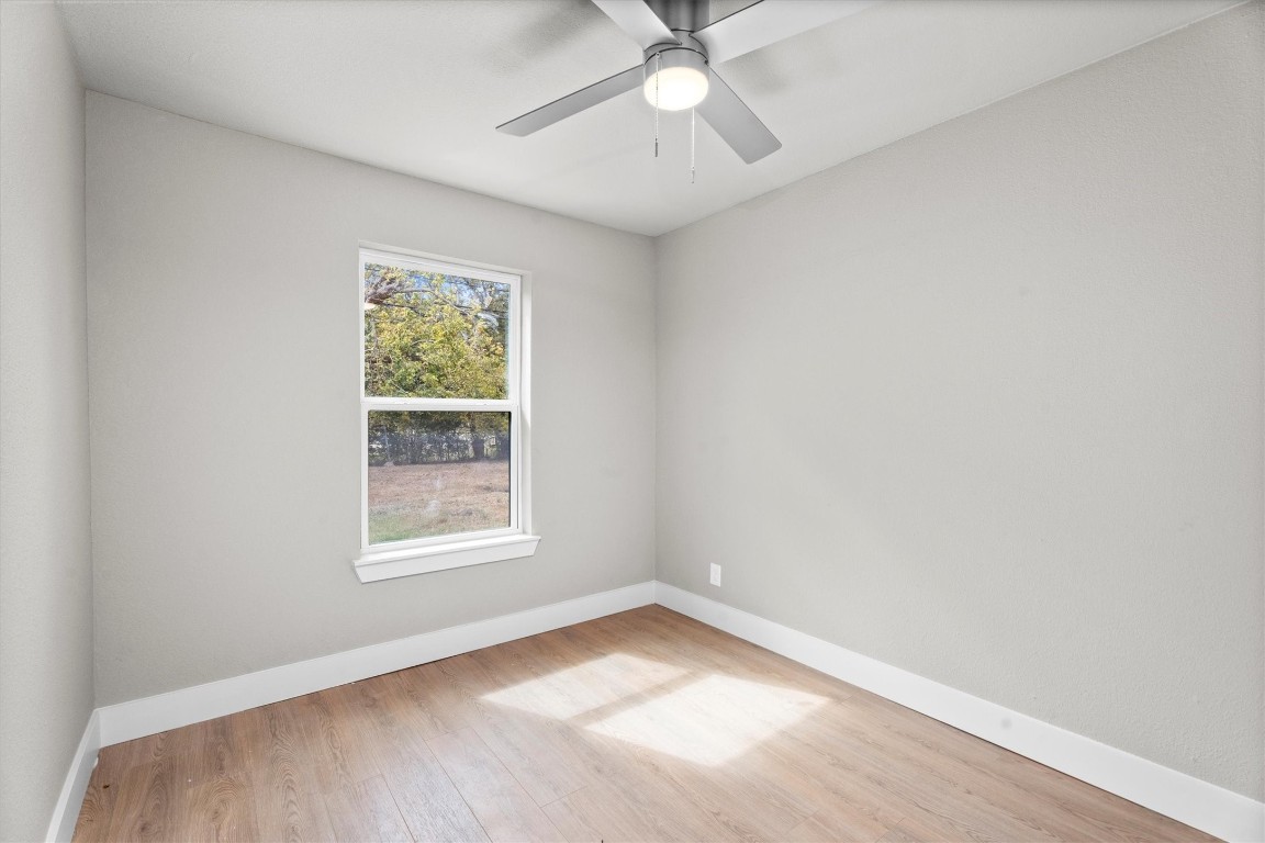 6162 Beldart Street Houston, TX 77033 - Photo 17 of 36 an empty room with a window