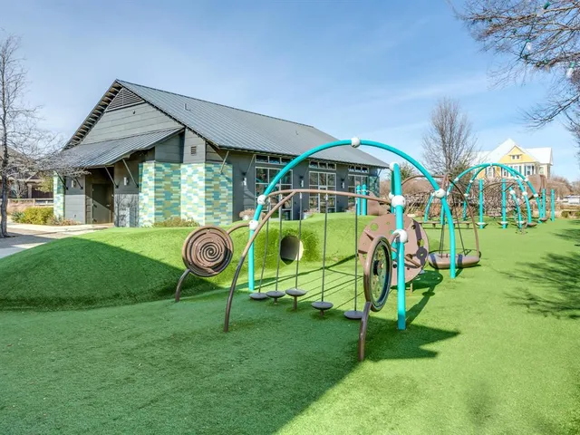 a view of a house with a yard patio and sitting area