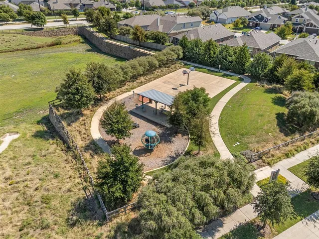 a view of a street with a houses