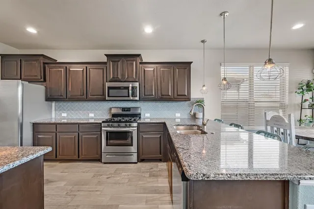 a picture of a bathroom with a shower