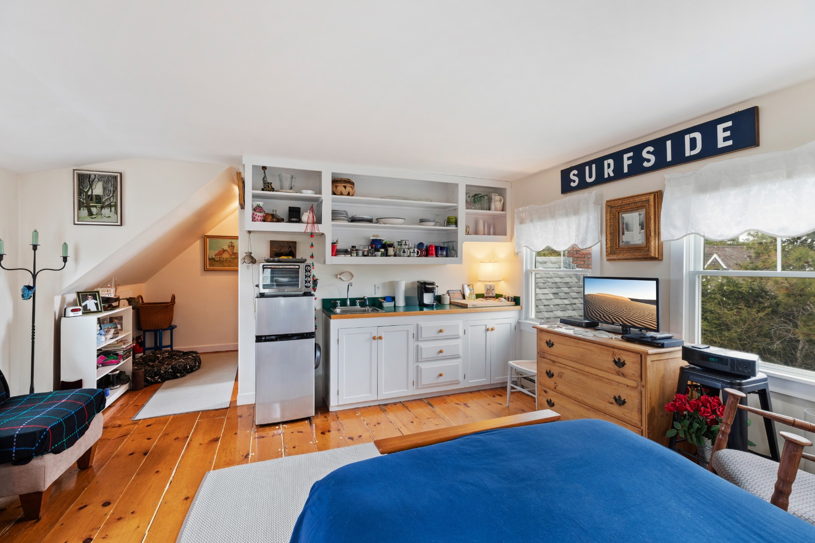 137 Surfside Road Nantucket, MA 02554 - Photo 19 of 24 a bedroom with furniture and a flat screen tv