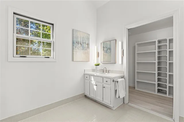 a view of cabinets and window