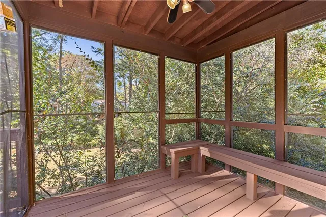 a living room with large windows