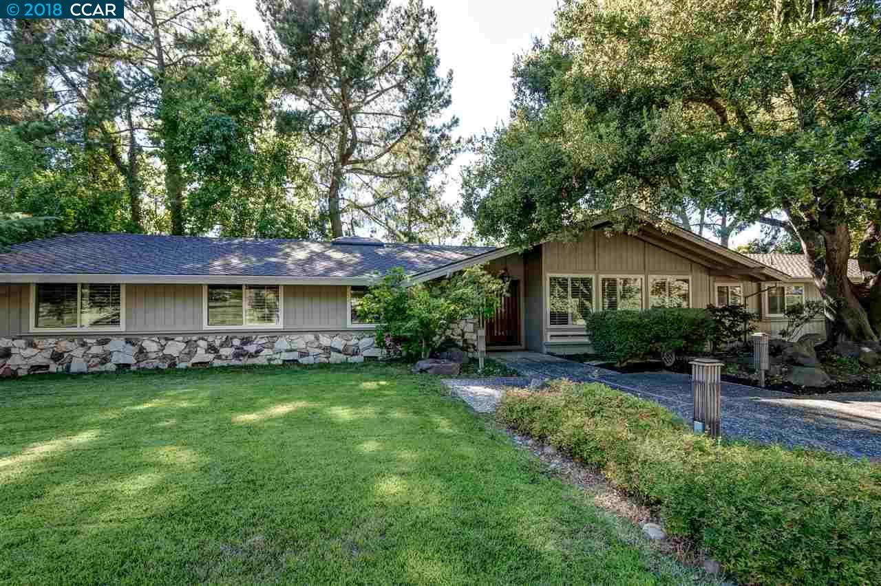3180 Roundhill Road Alamo, CA 94507 - Photo 1 of 1 a front view of a house with garden