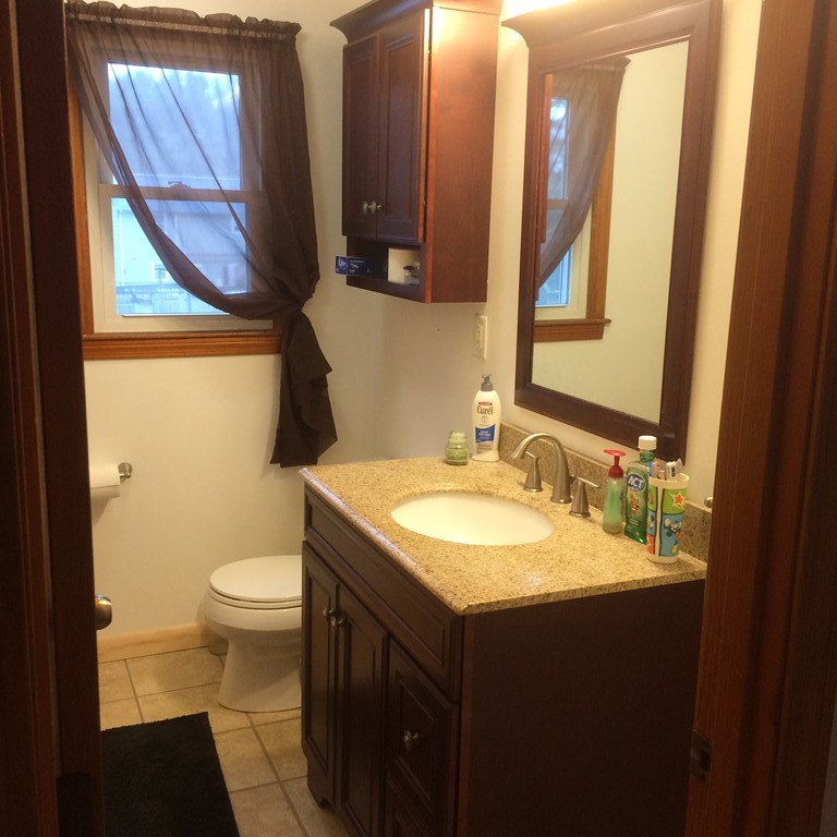 12 Kingsbury Road Webster, MA 01570 - Photo 7 of 18 a bathroom with a sink and a mirror