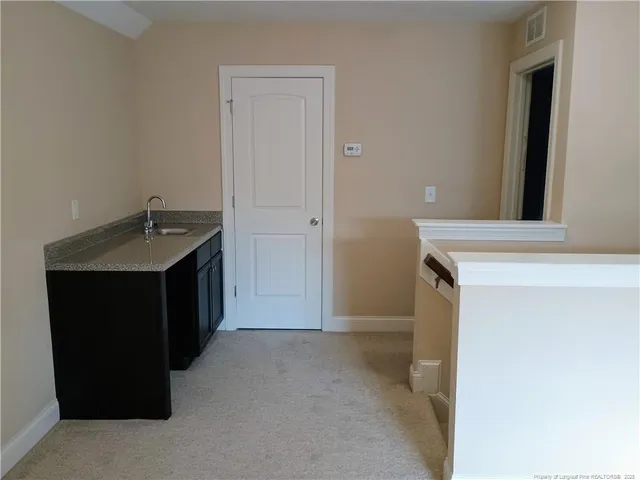 a utility room with washer and dryer