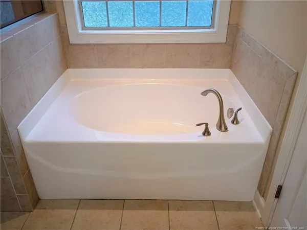a bathroom with a bathtub