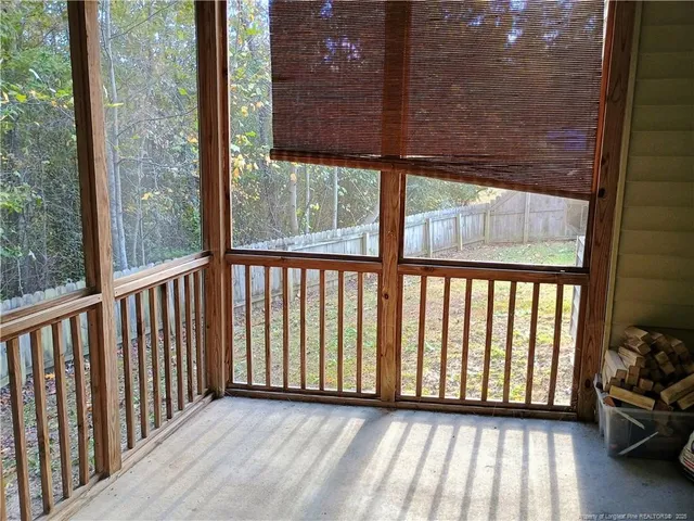 a view of a balcony with chair