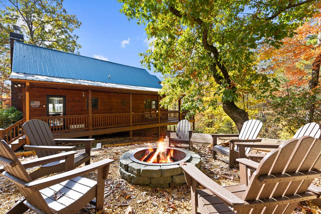 a backyard of a house with seating space