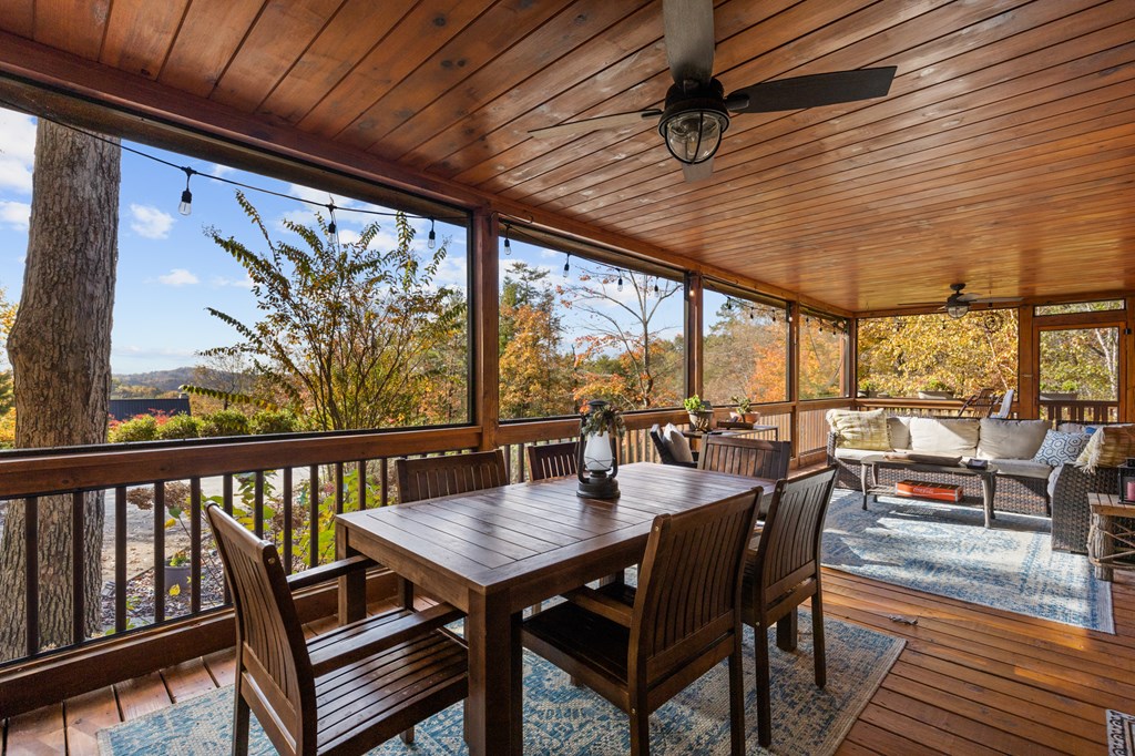 653 The Woods Road Mineral Bluff, GA 30559 - Photo 28 of 56 a view of a dining room with furniture window and outside view