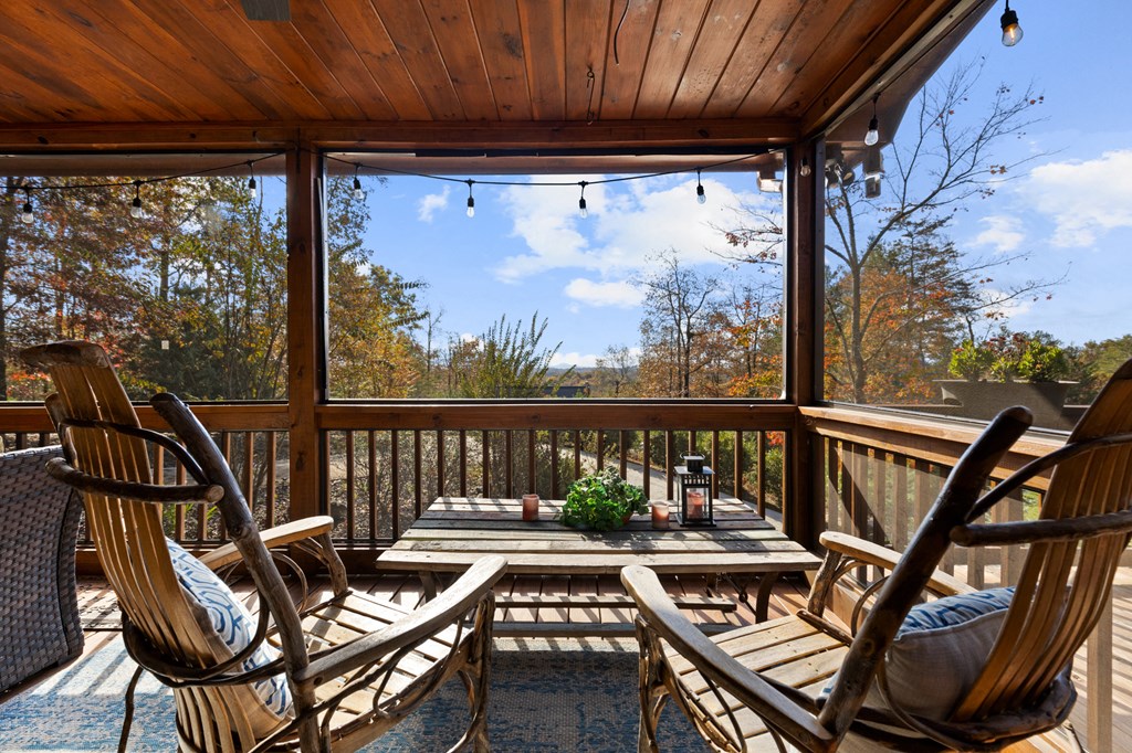 653 The Woods Road Mineral Bluff, GA 30559 - Photo 33 of 56 a view of balcony with furniture