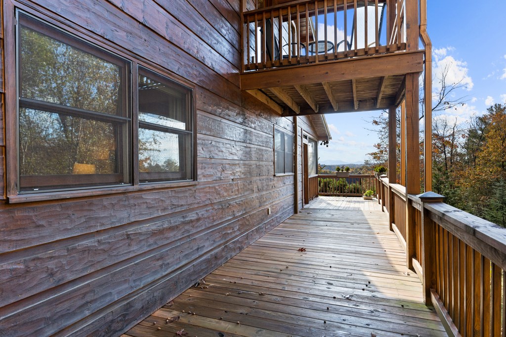 653 The Woods Road Mineral Bluff, GA 30559 - Photo 37 of 56 a view of a house with a window