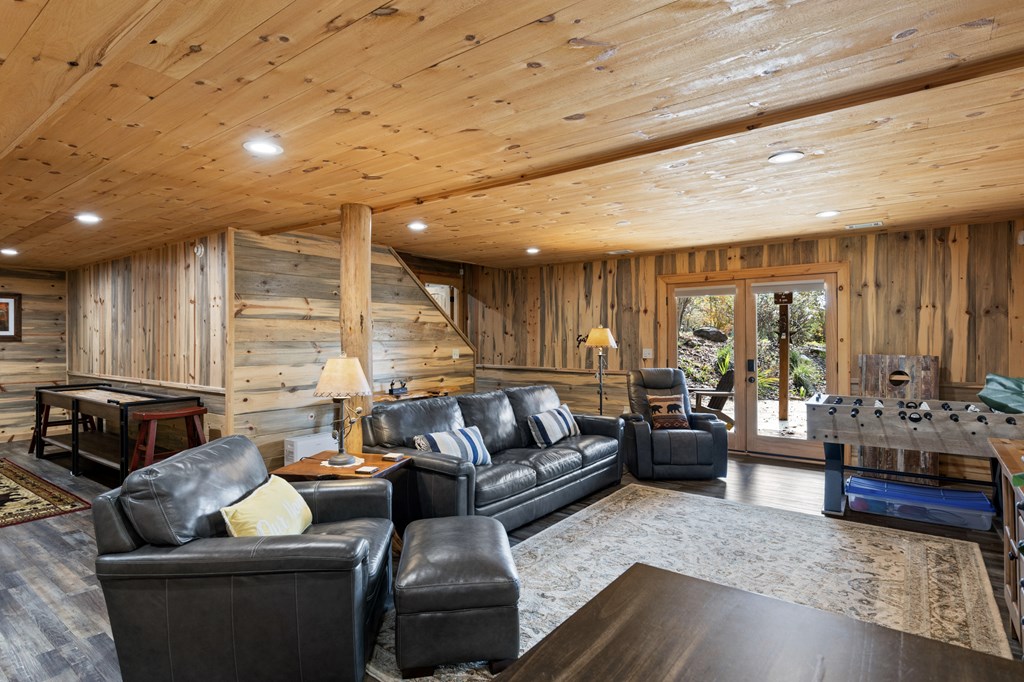 653 The Woods Road Mineral Bluff, GA 30559 - Photo 49 of 56 a living room with furniture and a large window