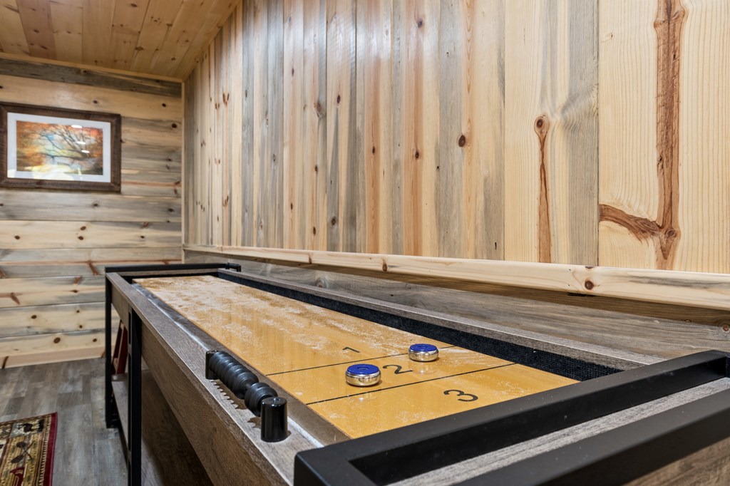 653 The Woods Road Mineral Bluff, GA 30559 - Photo 50 of 56 a view of a bath tub sitting in a bathroom