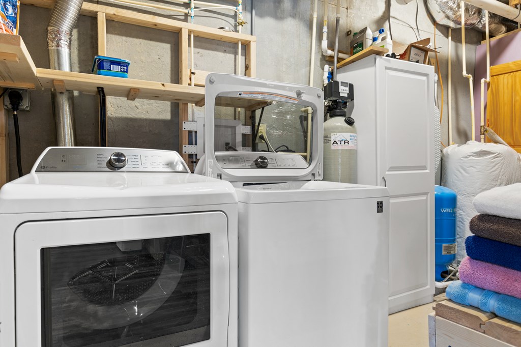 653 The Woods Road Mineral Bluff, GA 30559 - Photo 52 of 56 a utility room with dryer and washer