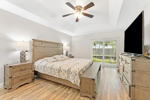 an aerial view of a house with a yard and a garden