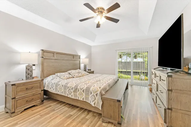 an aerial view of a house with a yard and a garden