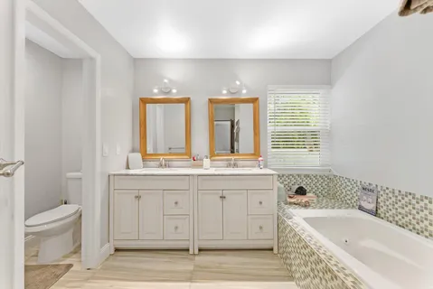 an aerial view of a house with a garden