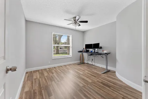 an aerial view of city and green space