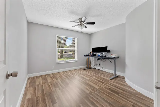 an aerial view of city and green space