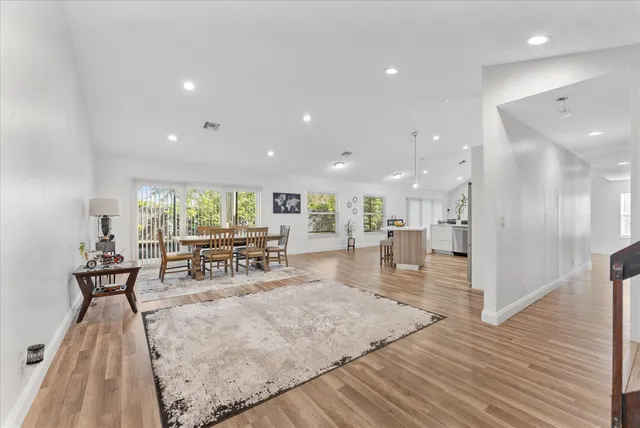 a view of a kitchen from the kitchen from a sink