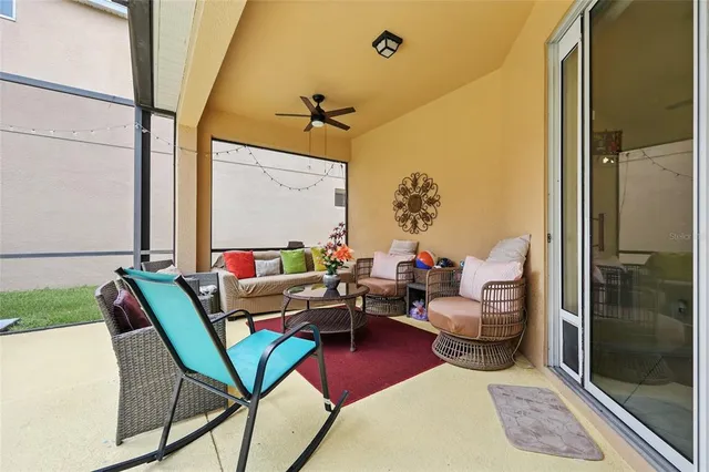 a view of a swimming pool with a patio