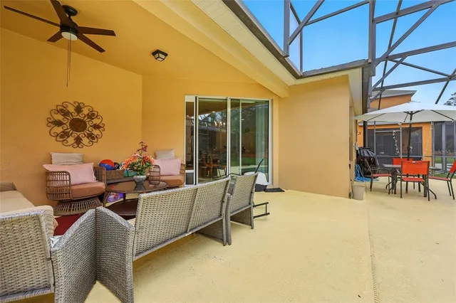 a view of swimming pool with a patio